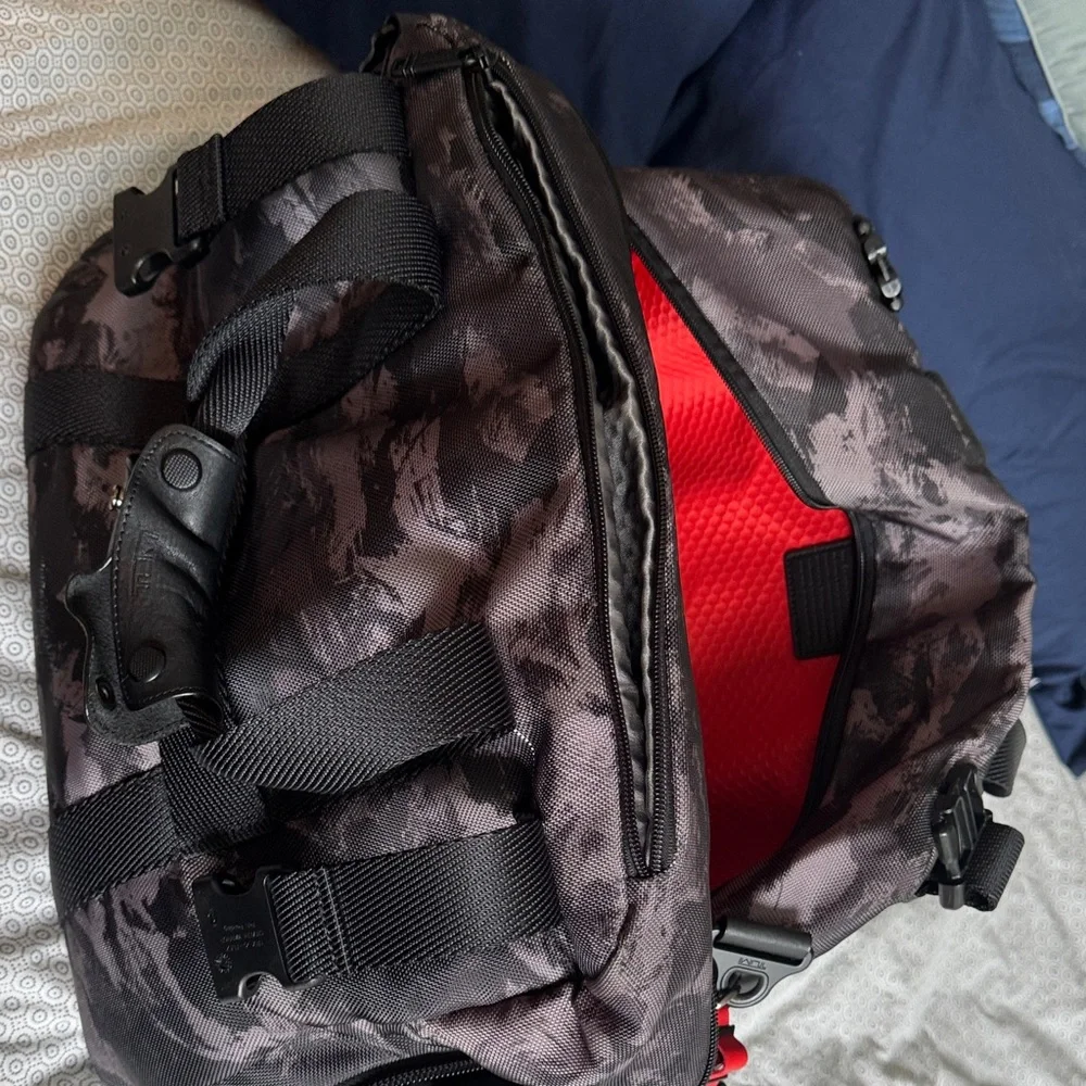 Tumi Black Camo Duffel Bag with Red Interior